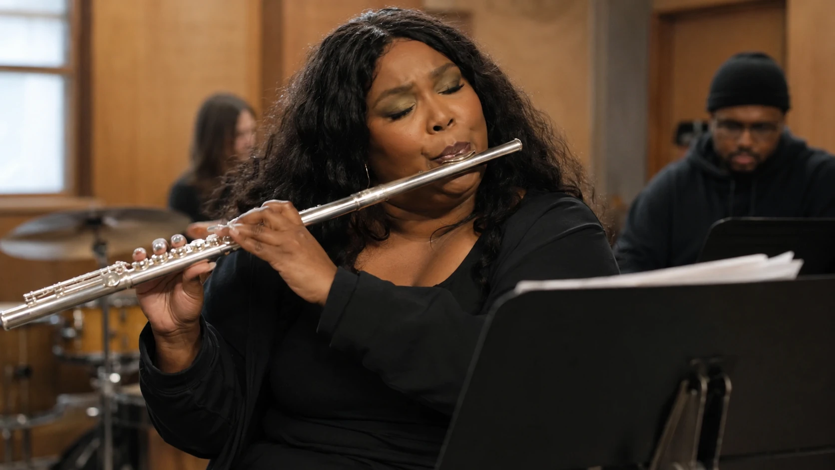 Education and Musical Training - lizzo weight and height