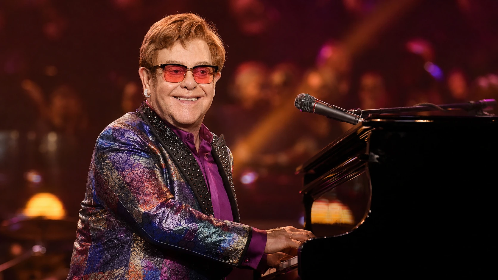 Elton John's Early Life and Rise to Fame - elton john and hillary clinton