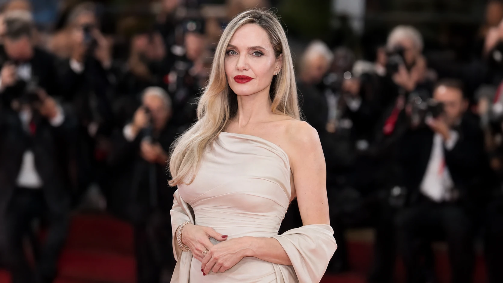 Angelina Jolie’s Public Life - angelina jolie and tom brady