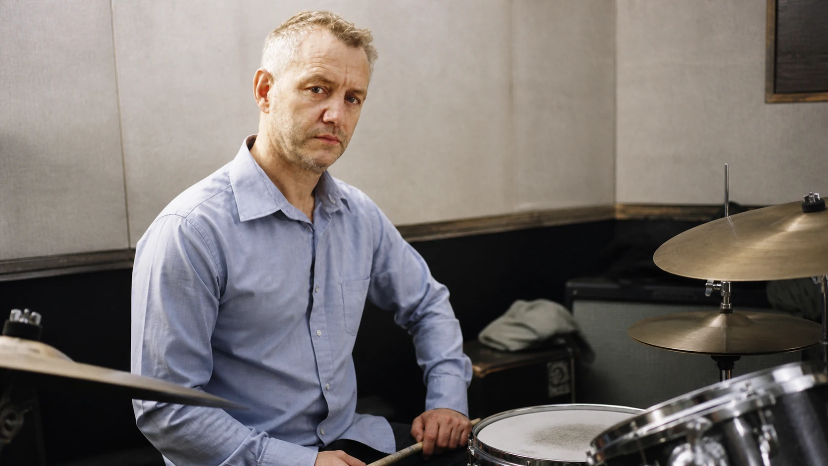 What is known about his work as a drummer - Baxter Neal Helson